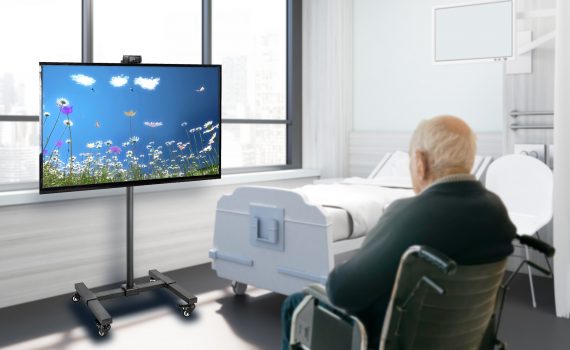 An older adult watches the MindfulGarden Platform