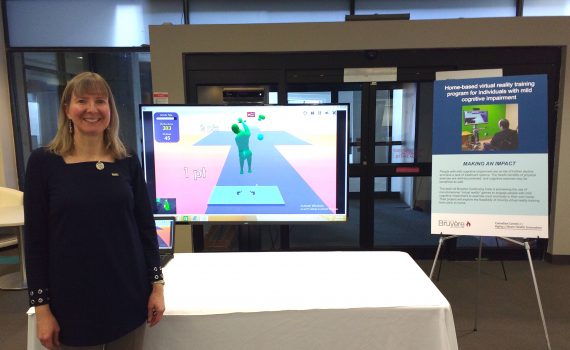 Dr. Lisa Sheehy poses with exergaming technology