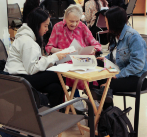 Students and seniors spend time together as part of the Zeitgeist project
